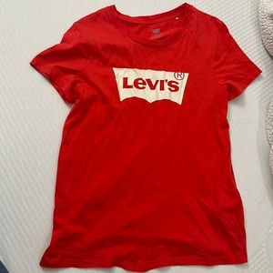 Red levis. Never worn but without tags.